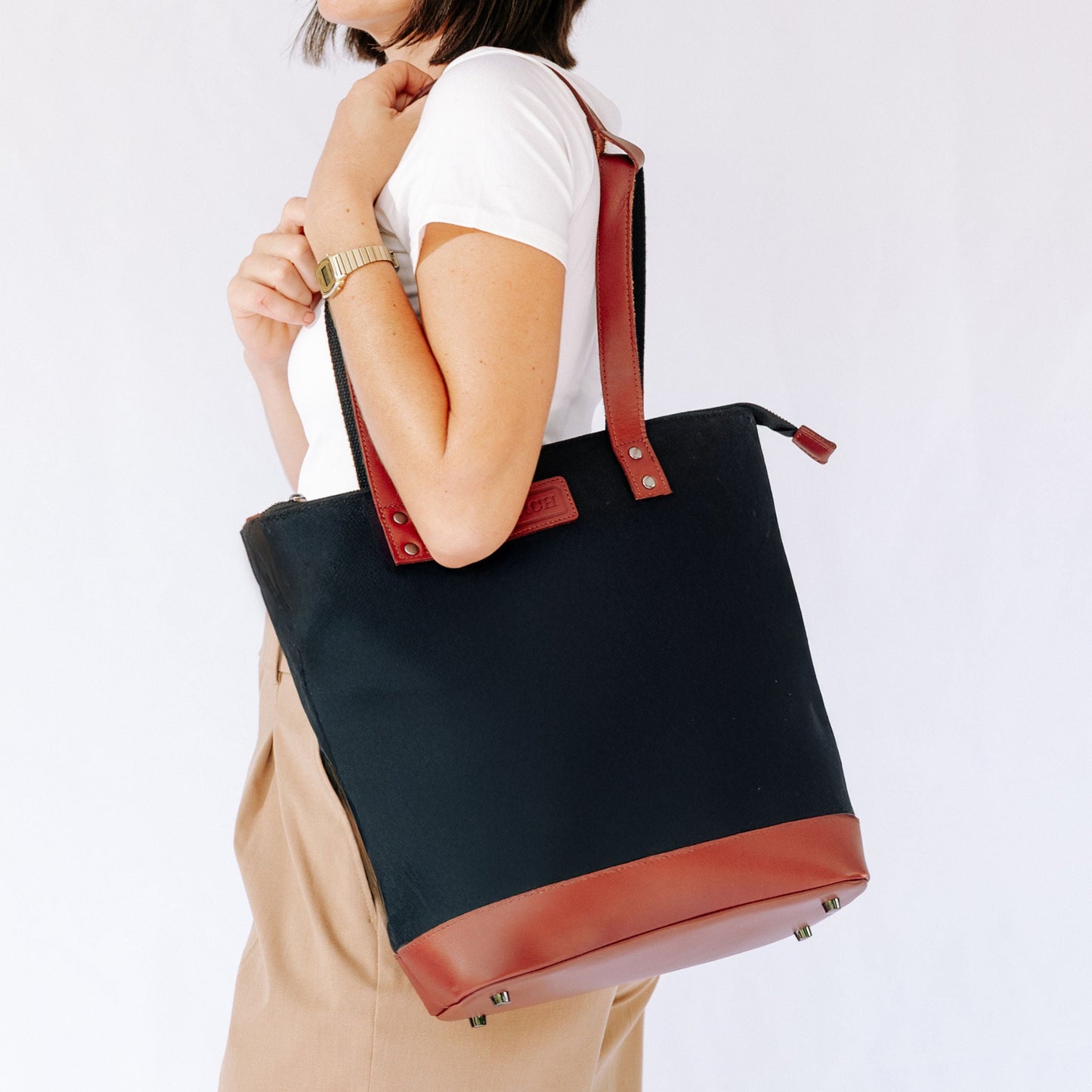work bag worn in shoulder bag style